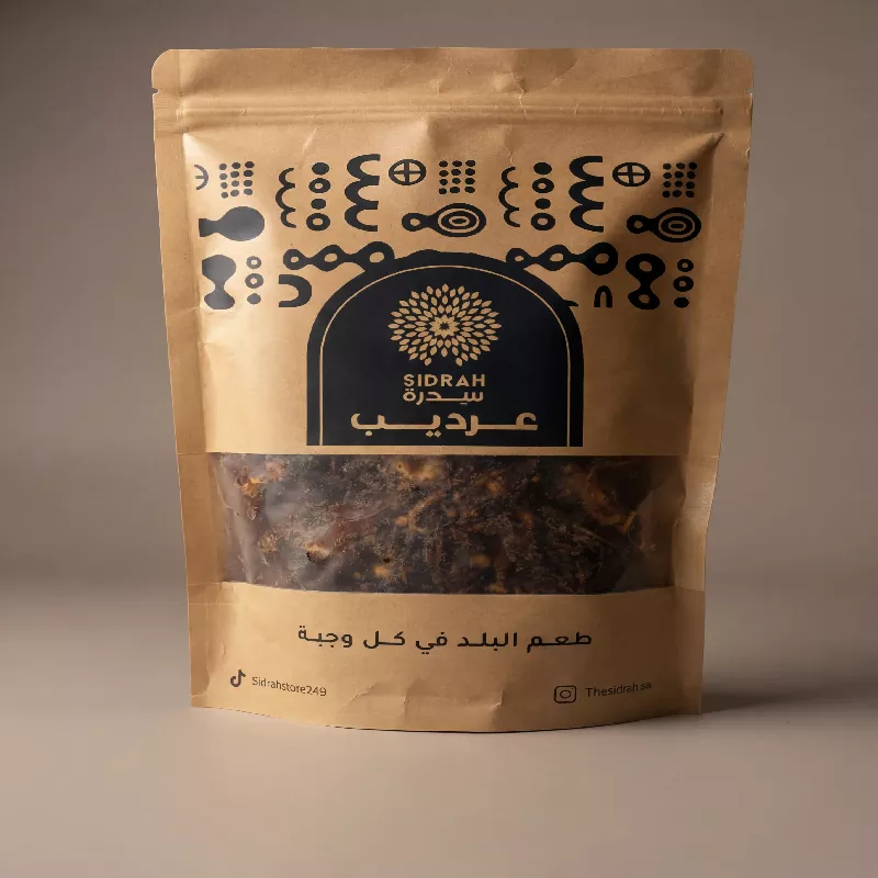 ثمار عرديب (تمرهندي) طبيعي مجفف من سدرة، معبأ في كيس ورقي بتصميم تراثي (Doypack) يظهر جودة المنتج السوداني.